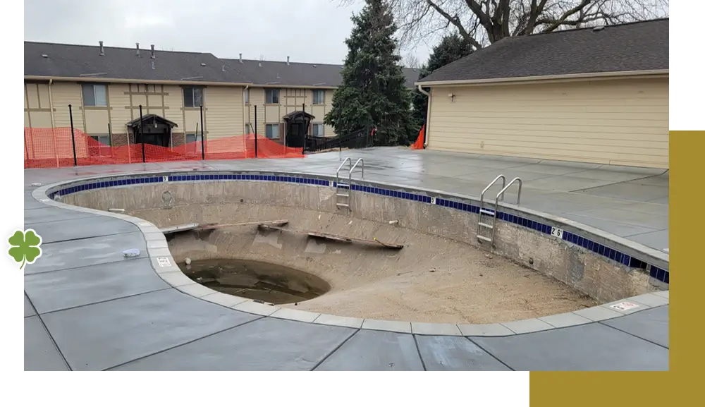 A pool that has been dug out of the ground.